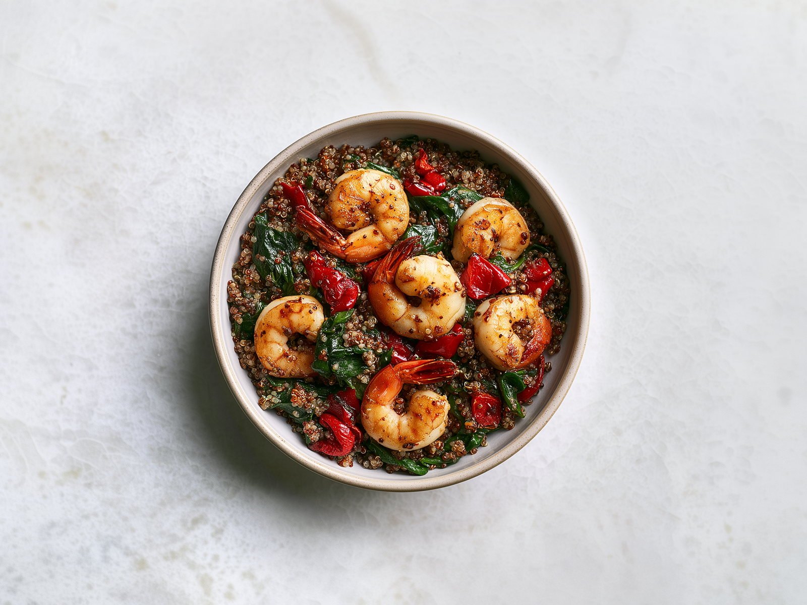 A bowl of food on a light table